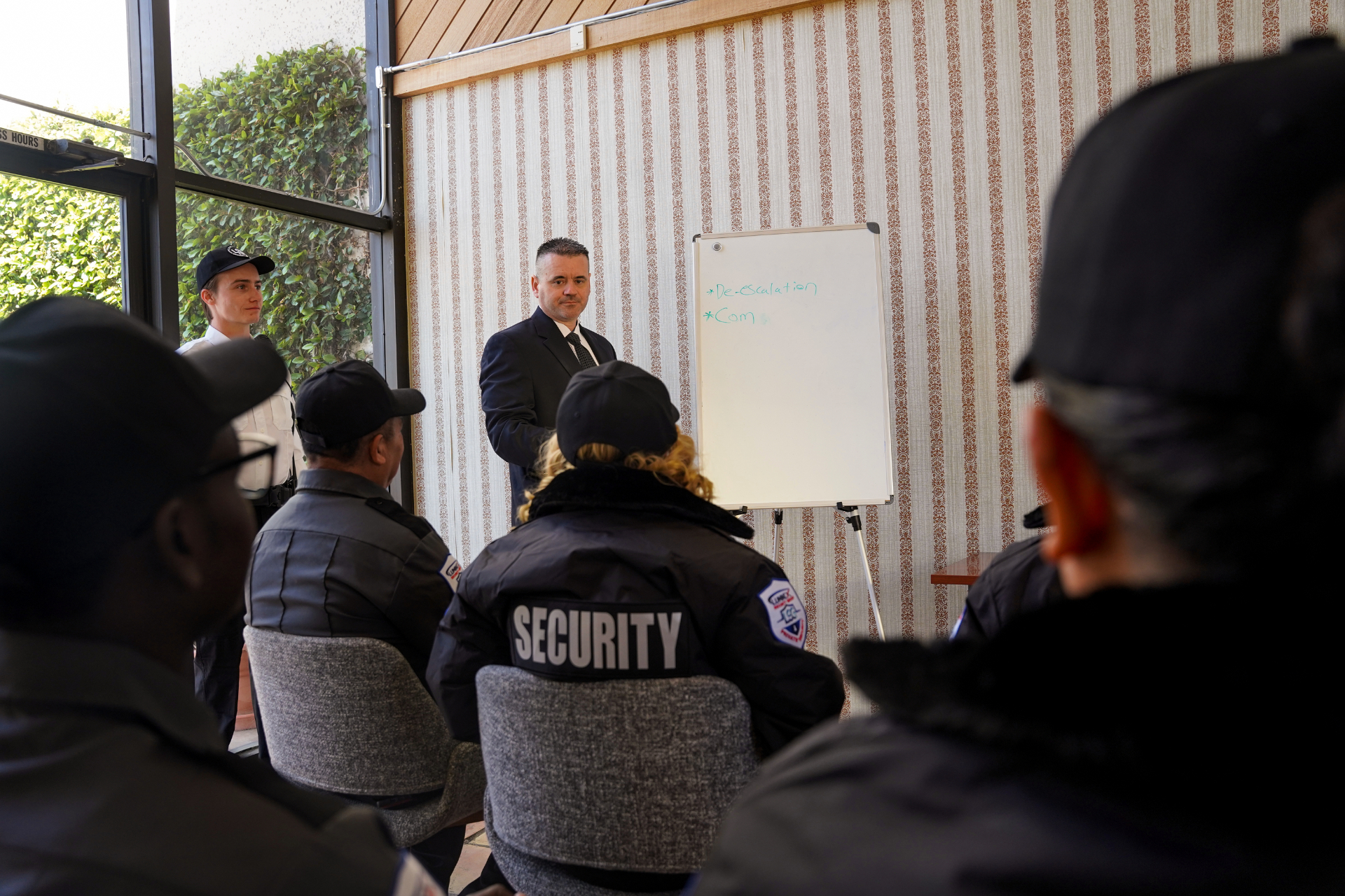 Luminex officers in a de-escalation training briefing